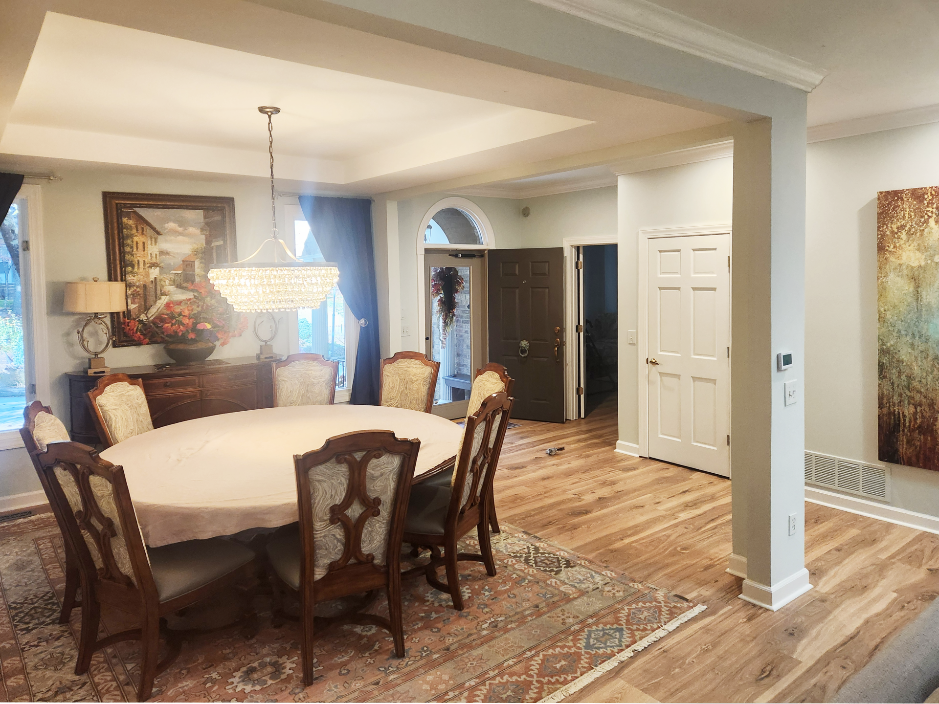 Carriage park dining room after remodel with only one structural column remaining, extra wall with entry and slender columns removed
