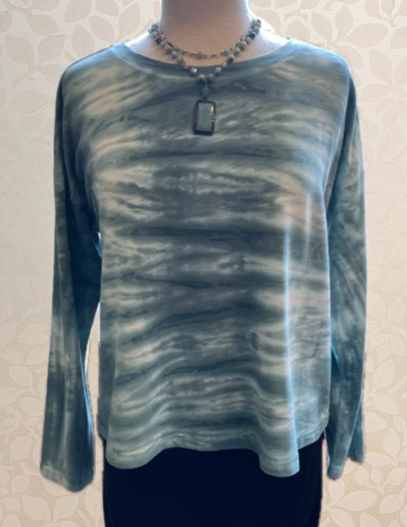 River Sunset Pullover from Escape shown in teal. Also available in navy and volcano.