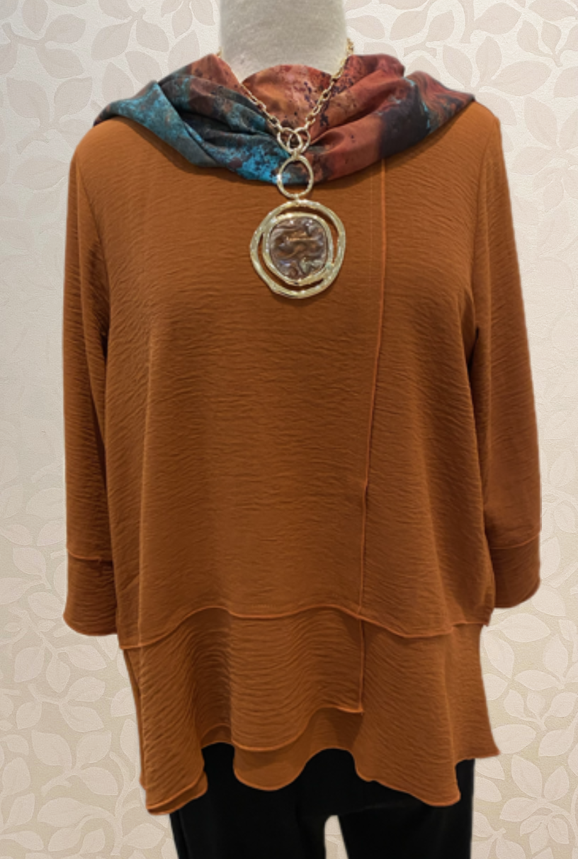 Solid Airflow Basic Button Detail Top from Shana in rust, also available in brown.