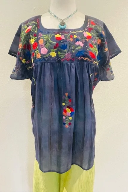 Anu Embroidered blouse with Tribal Flare Pant with Smocking and a necklace by Carol Kent