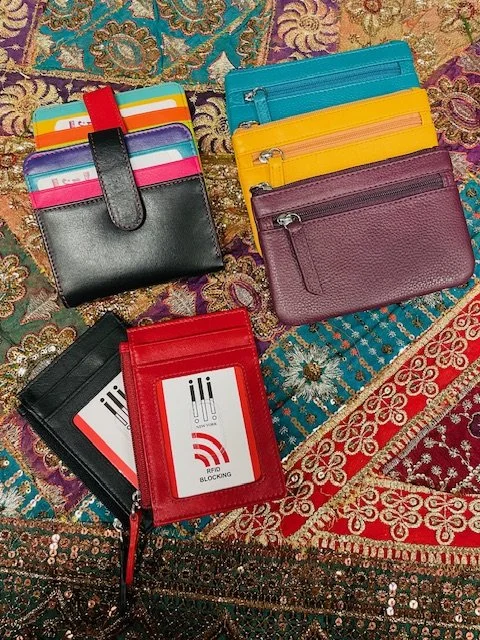 We have a colorful collection of ILI Zip Card ID holders, Coin Purses and Small Bifold Wallets.