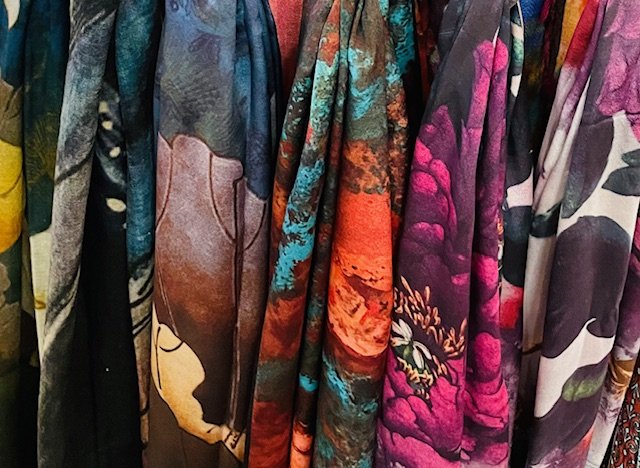 We have a beautiful selection of scarves.