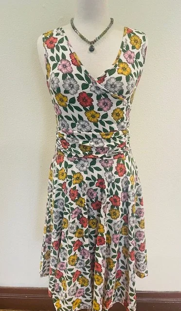 Effie's Heart Calistoga Dress in Wild Rose with a necklace by Rain.