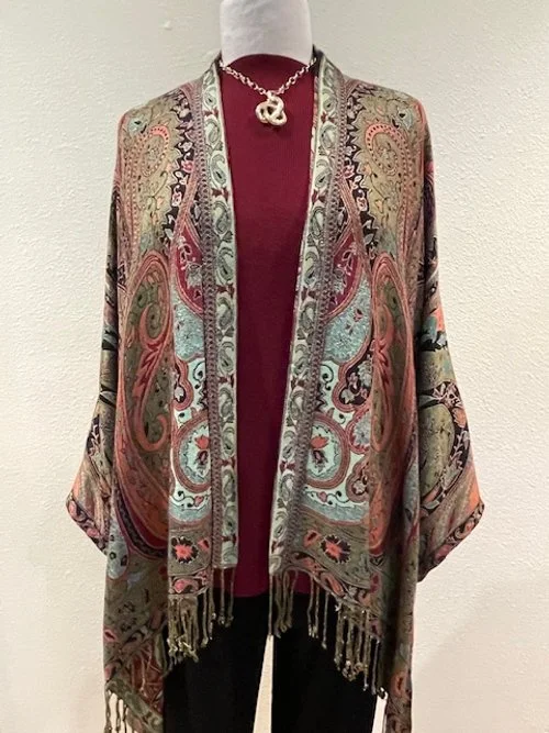Best of Kashmir Long Jacket featured in the color lime is a beautiful piece made in India, 100% rayon.