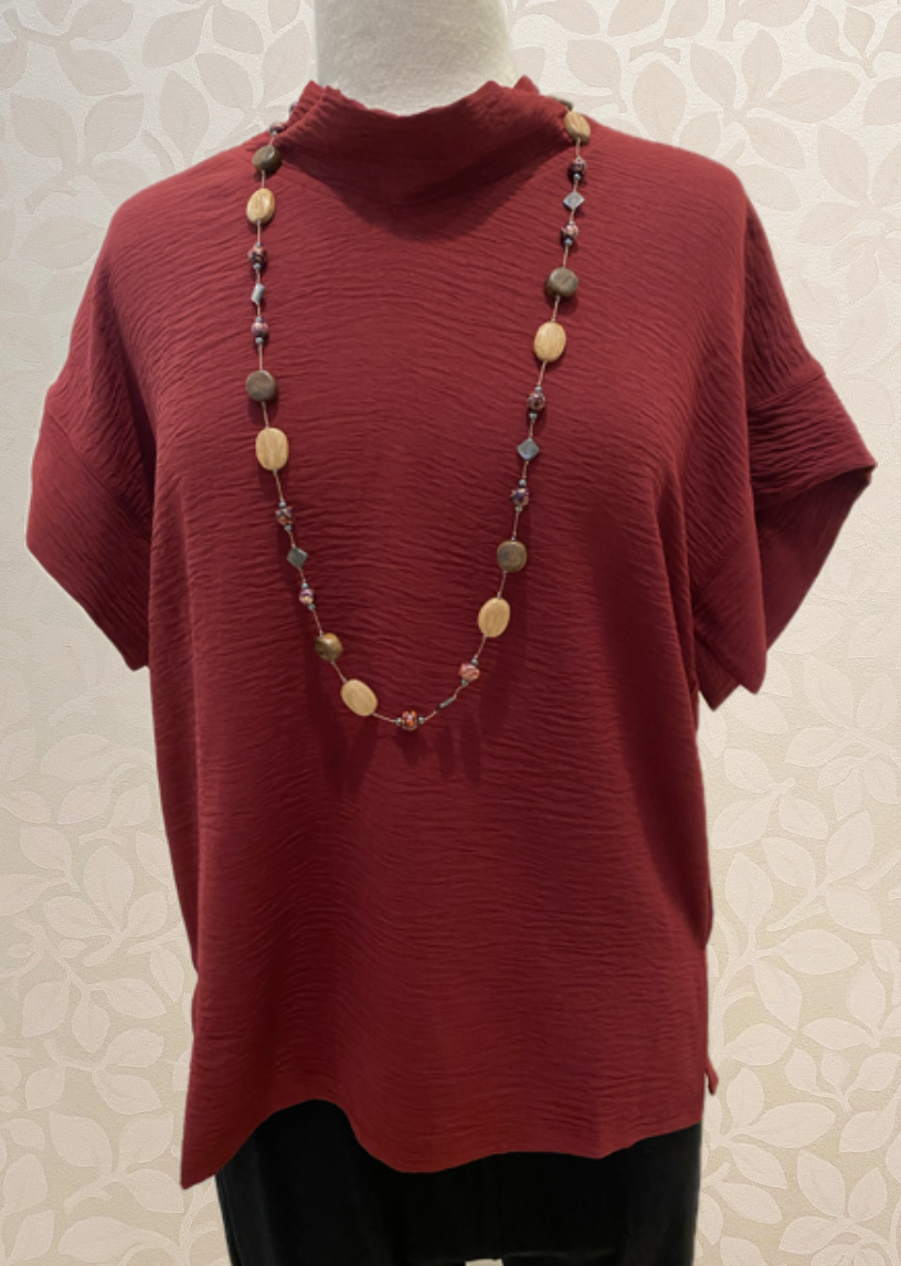 Solid Airflow Mock Neck Top from Shana in wine.
