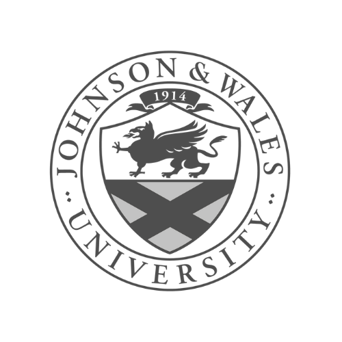 The emblem of Johnson & Wales University featuring a shield with a lion, the year 1914, and the university's name in a circular border.