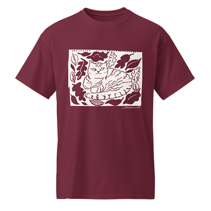 Maroon T-shirt with a white graphic of a sitting cat surrounded by leaves with the word 'sketchcat' written in the bottom right corner.
