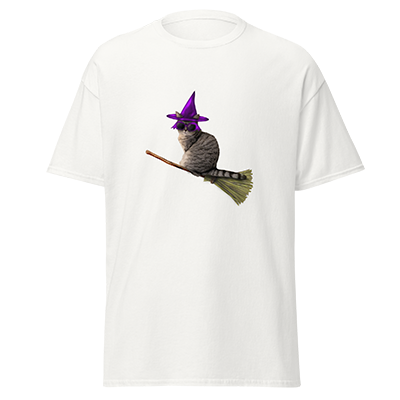 White T-shirt featuring a cartoon cat wearing a purple witch hat, riding a broomstick.