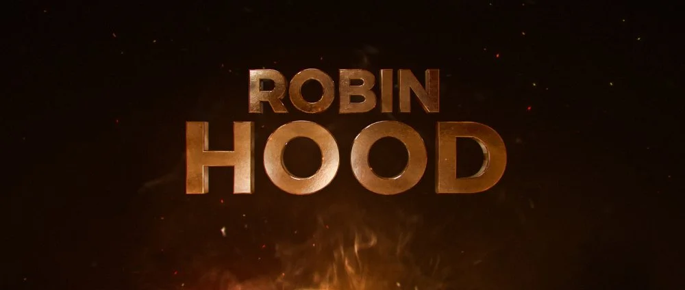 Title screen with the text 'Robin Hood' in bold, metallic, gold-colored letters against a dark background with sparks and fire.