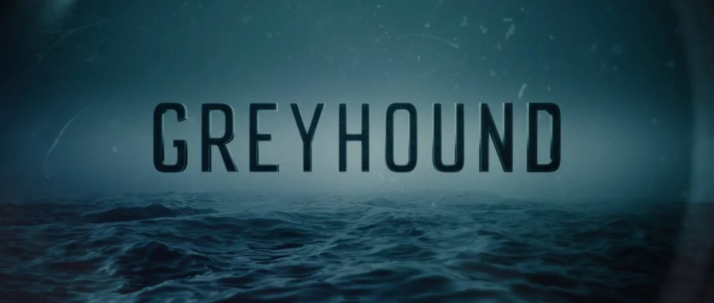 Title screen with the text 'GREYHOUND' over a backdrop of ocean waves and a stormy sky.