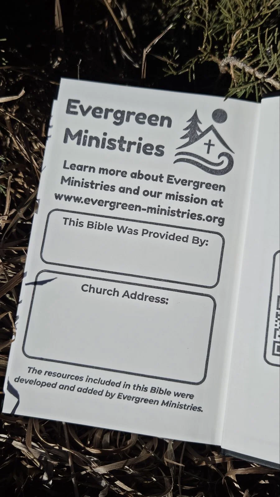 A brochure from Evergreen Ministries with an illustration of a pine tree, mountain, and sun. It invites people to learn more about their mission and provides spaces for church details.