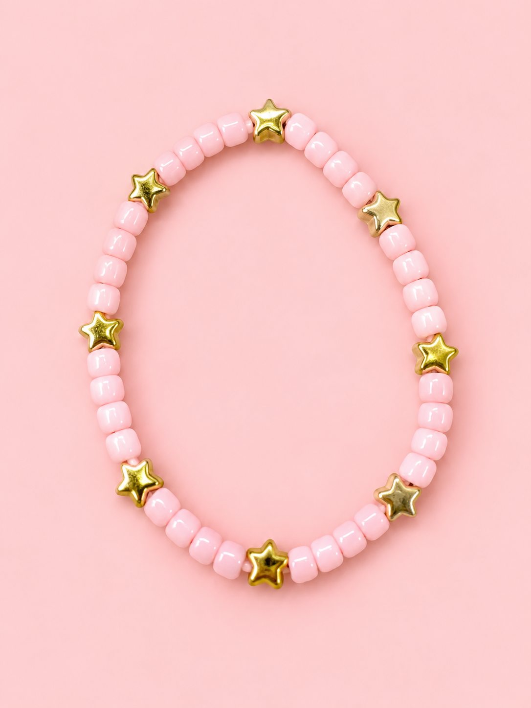 Pastel Pink Star Beaded Bracelet.png