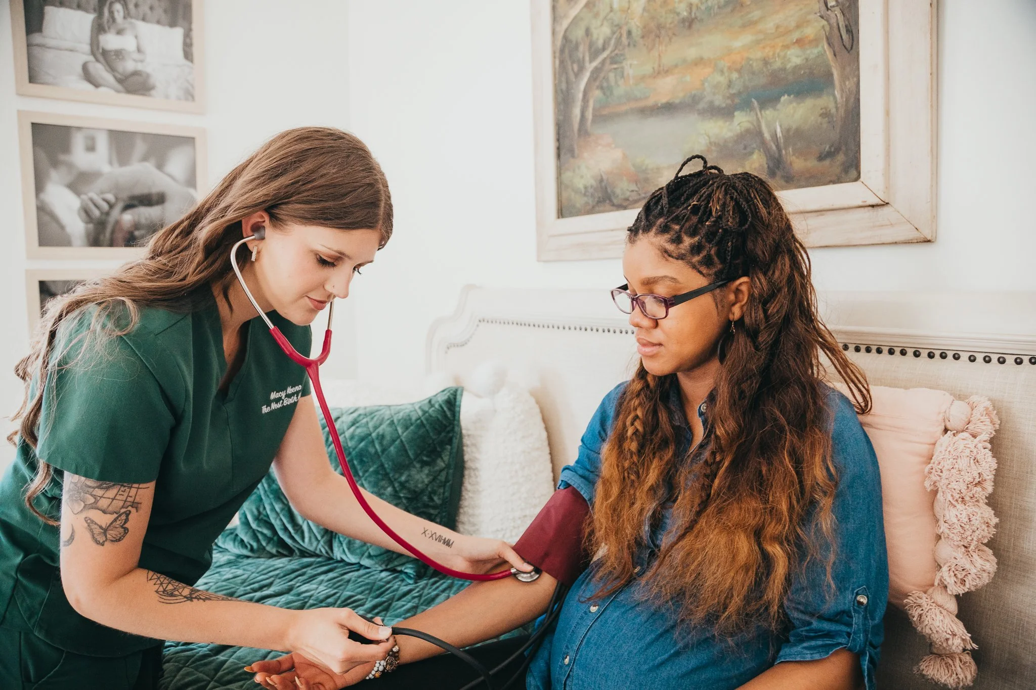 A nurse taking a patient's blood pressure with a stethoscope in a bedroom.