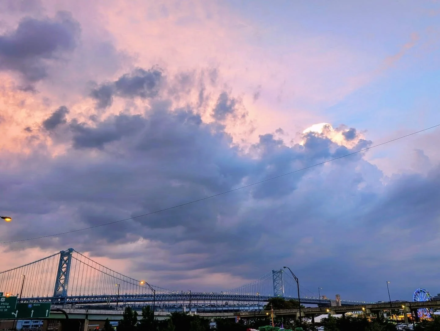Stormy city #pennslanding #philadelphiawaterfront  #benjaminfranklinbridge