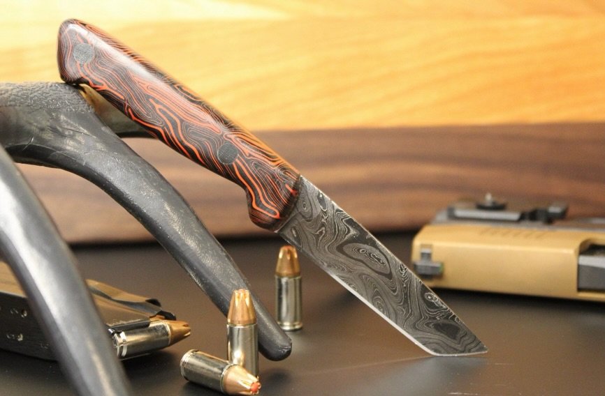 DAMASCUS TANTO 🔥

This Custom Order Tanto Was 7&rdquo; In Total Length With A 3&rdquo; Blade. For The Handles We Went With Black &amp; Red Damascus Pattern G10, And Paired It With A Black &amp; Red Topographical Sheath!

#CKKnifeCompany #customknive