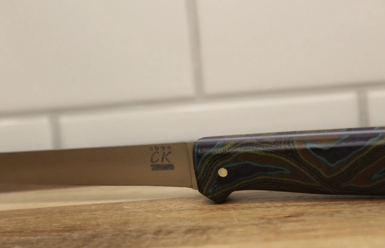 Micarta peacock handle