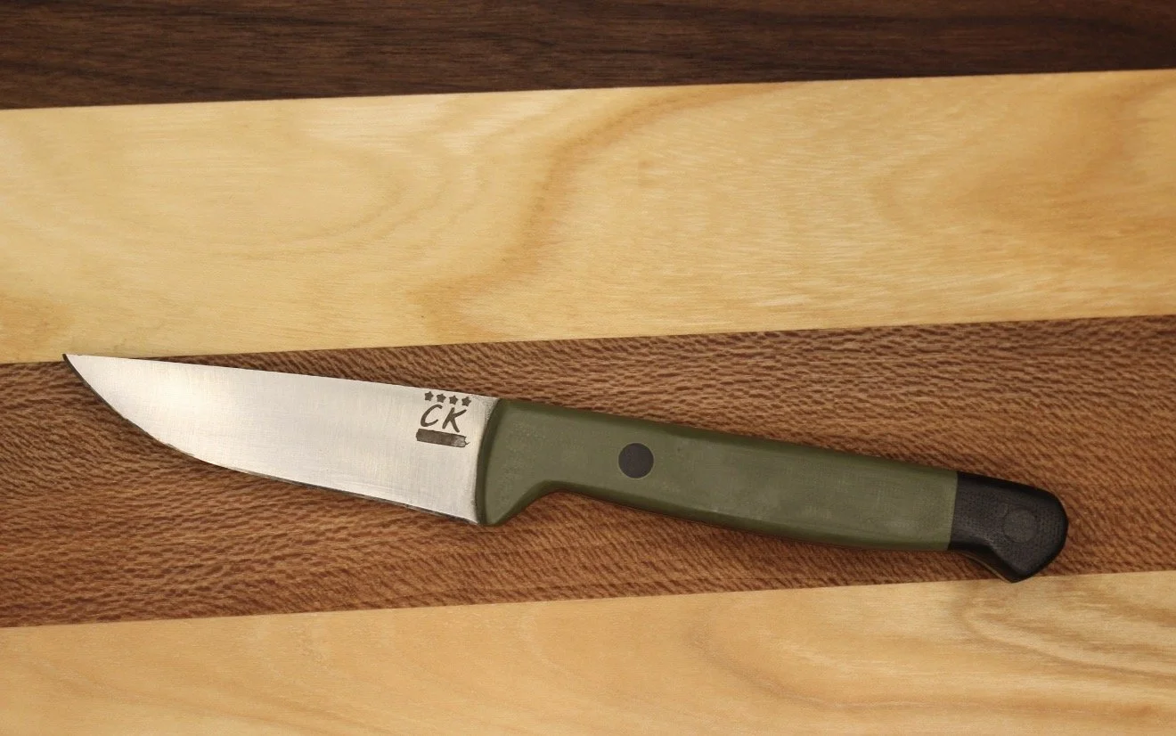 "Canyon" with green and black handles