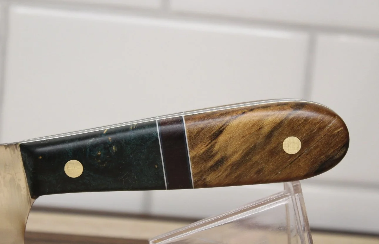 Close-up of knife handle with wood handle