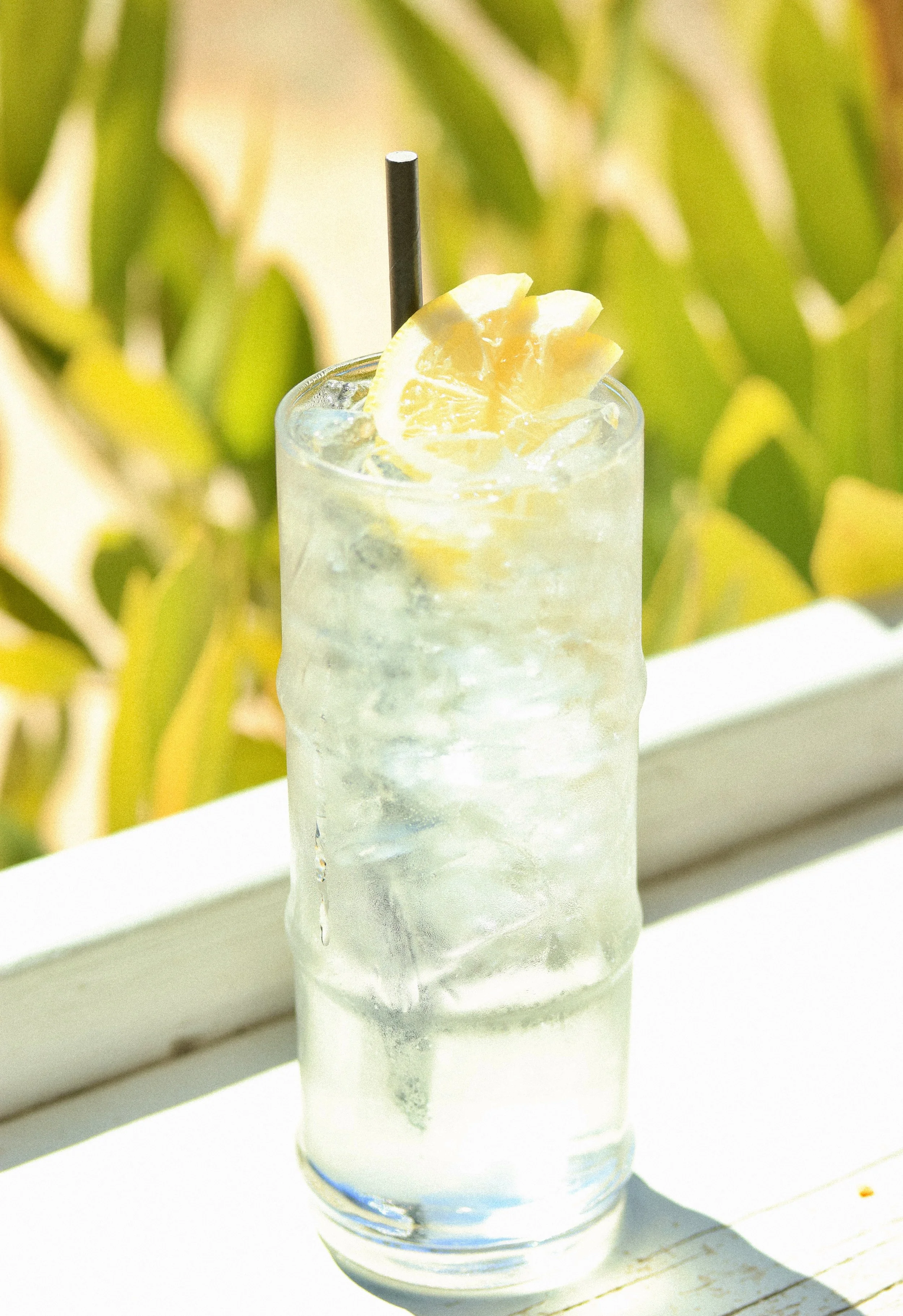 a spritz, with locally made spirit, prosecco, orange and rosemary