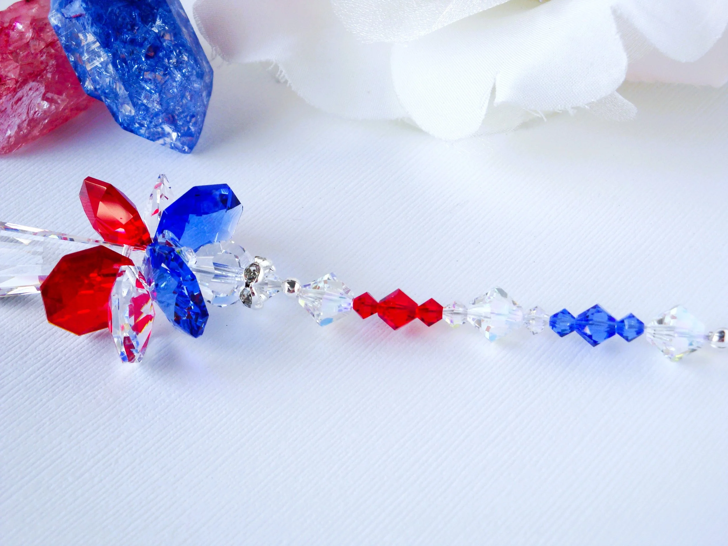 red white and blue angel laying down.JPG