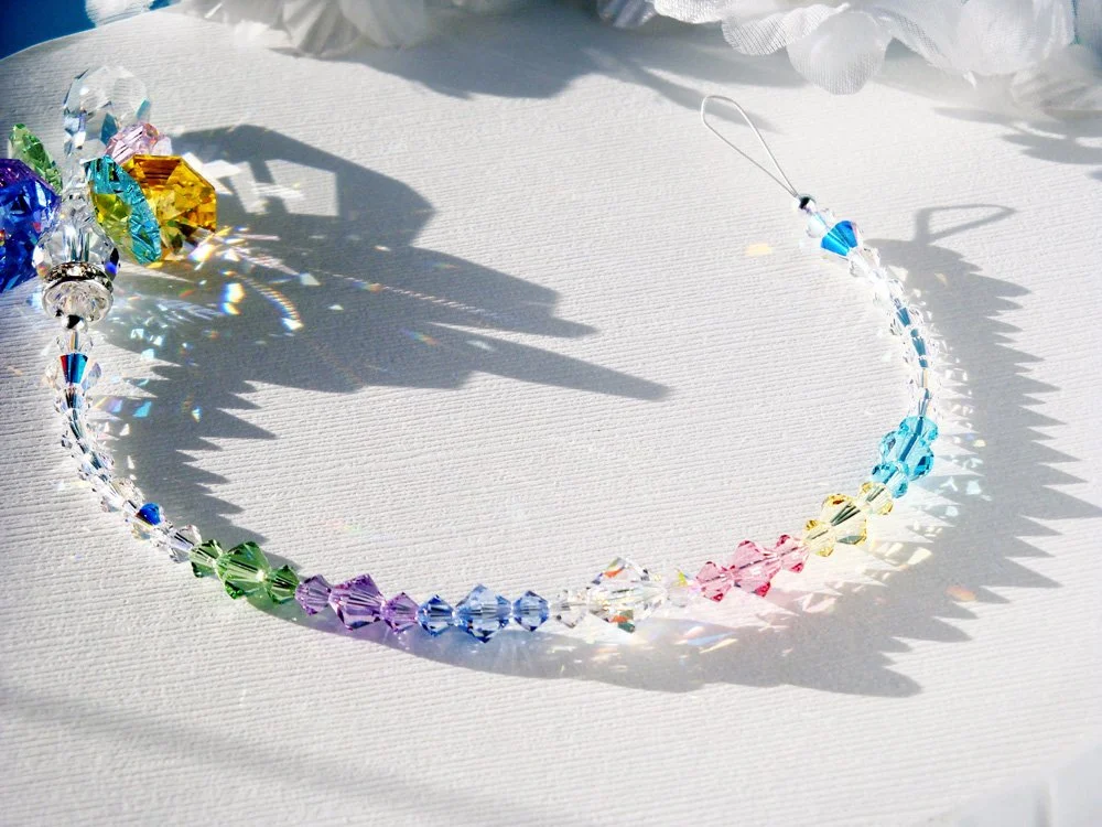 rainbow angel suncatcher laying down_edited-1.jpg