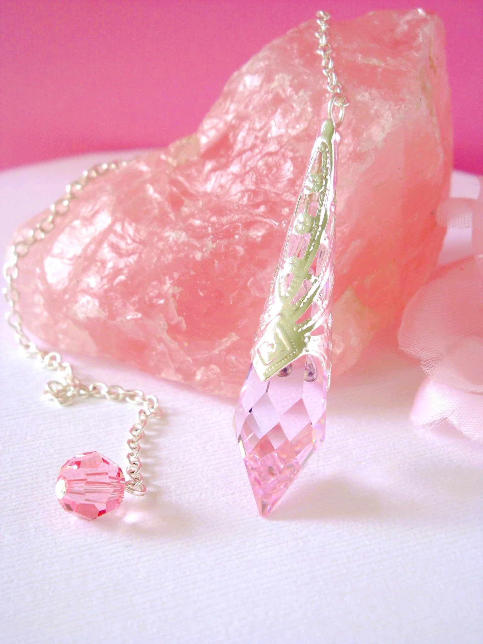 Pink Crystal Divining and Dowsing Pendulum created with a Swarovski Crystal Pendant by Crystal Blue Designs.