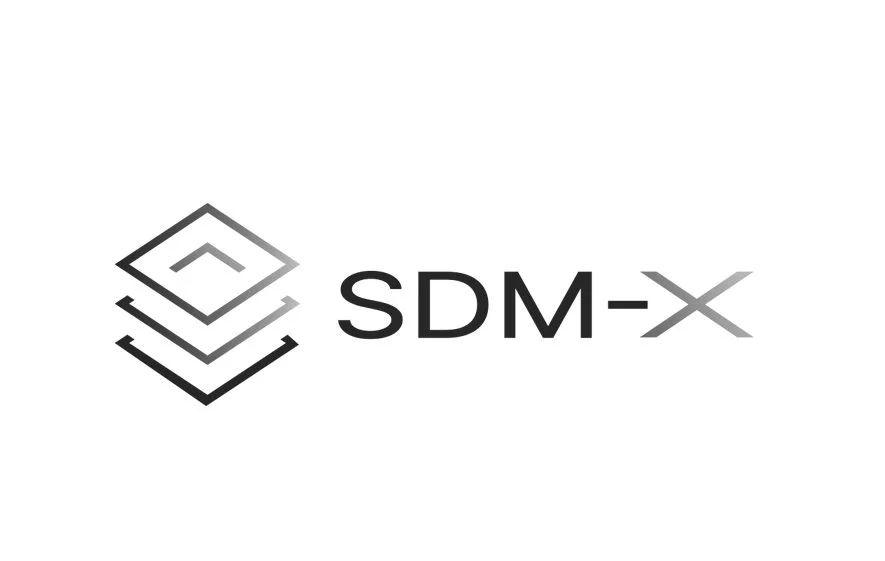 SDM-X.au logo representing Arrow’s full-service partnership delivering business planning, marketing strategy, branding, website design, and sustainability communications for Australian organisations.