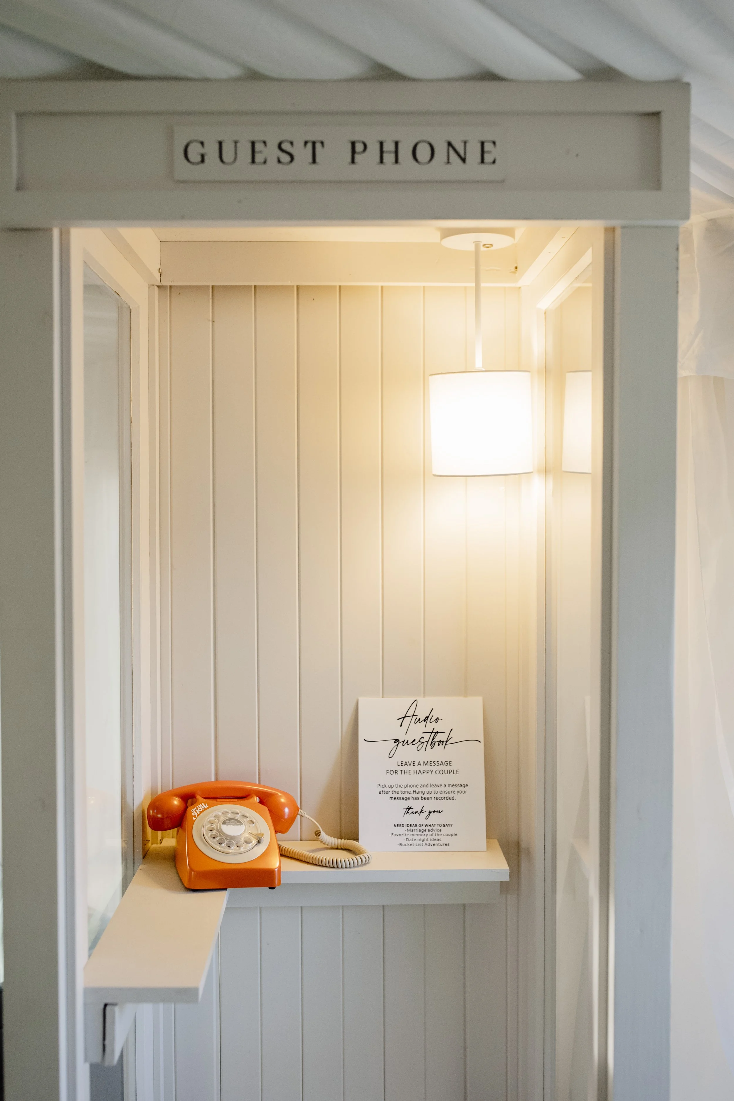 Geometric drawing of an outline square with sections divided by vertical, horizontal, and half circle lines.