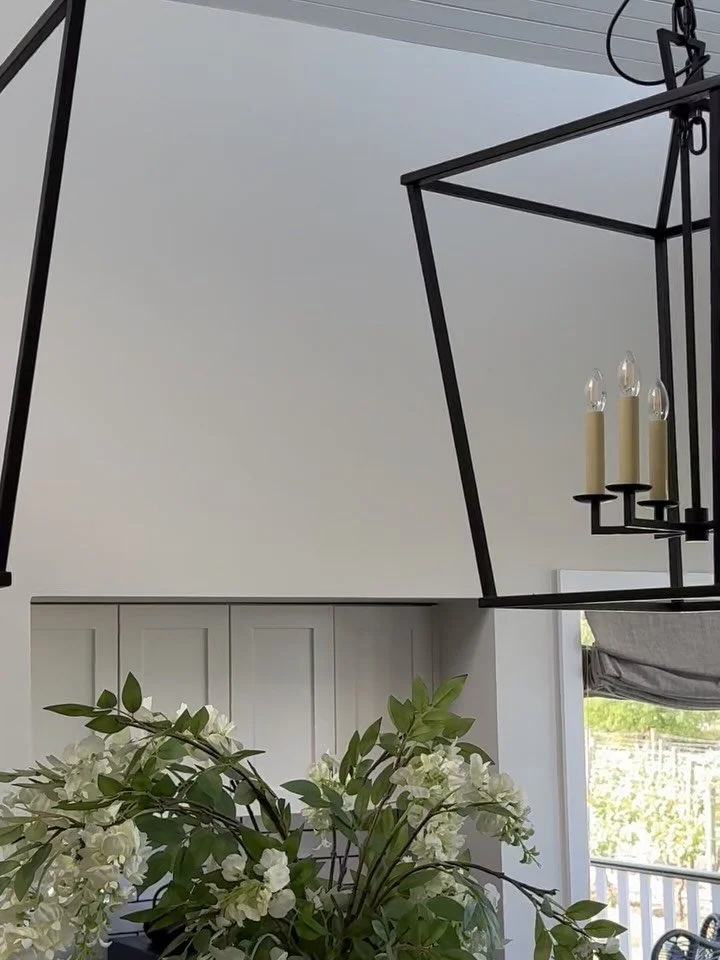 The Oakey Creek kitchen and dining space is all about quiet, intentional layering.

Behind the scenes, every detail was considered - warm timber tones, softly veined stone, integrated storage, and lighting that shifts the mood from busy mornings to s