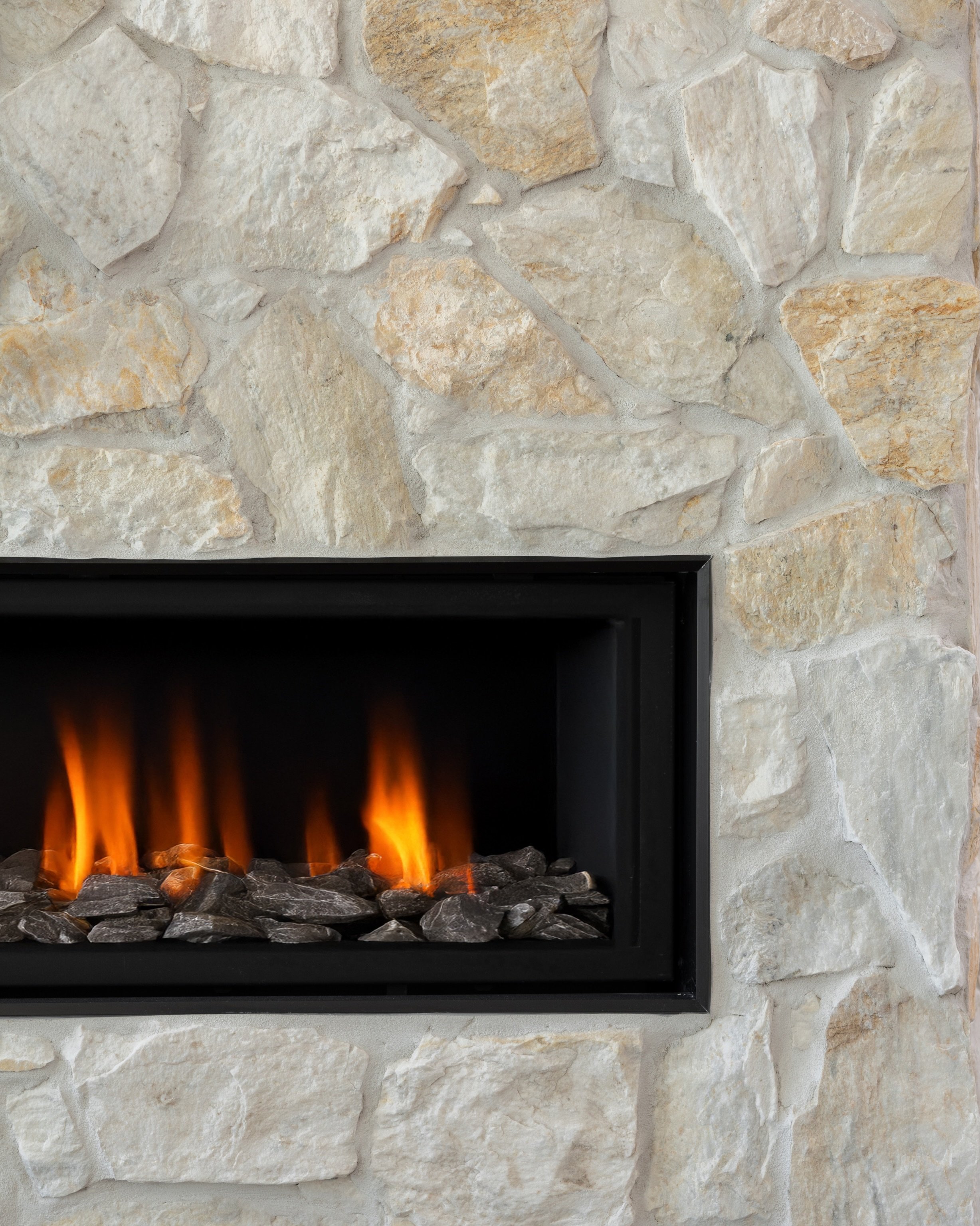 The selection that ignited the entire project (pun intended 😉) 

This fireplace, clad in @stone_style__ &lsquo;Oslo&rsquo; natural limestone, brings together a soft blend of creams, taupes and gentle grey tones - creating a feature that feels both g