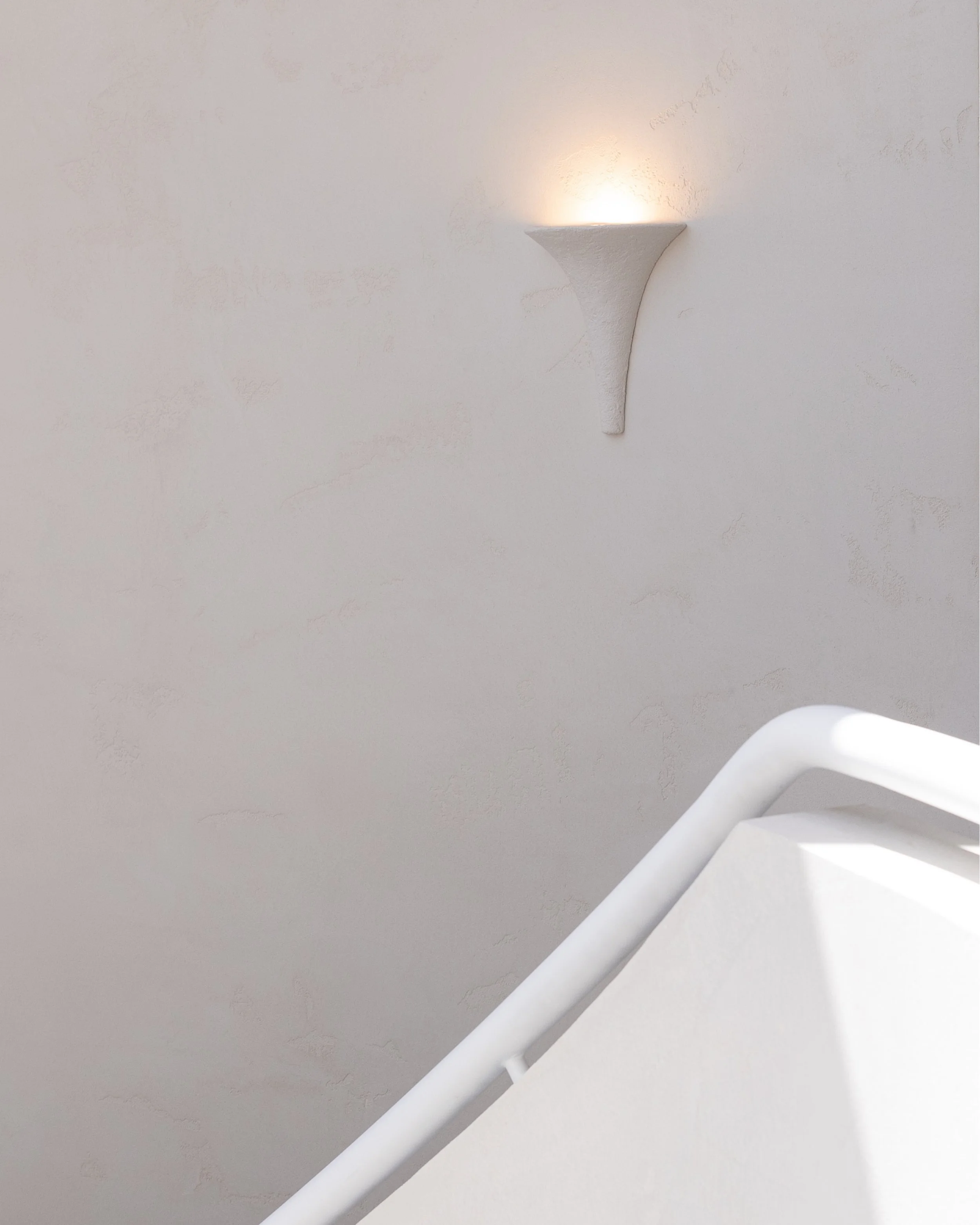 Soft curves, quiet light, and texture that speaks without trying.
A moment of calm, carved into the everyday.

#interiors #minimalliving #texturedwalls #calmspaces #featurelighting