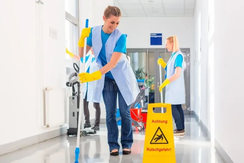 commercial-cleaning-brigade-working-mopping-floor-58190196.webp