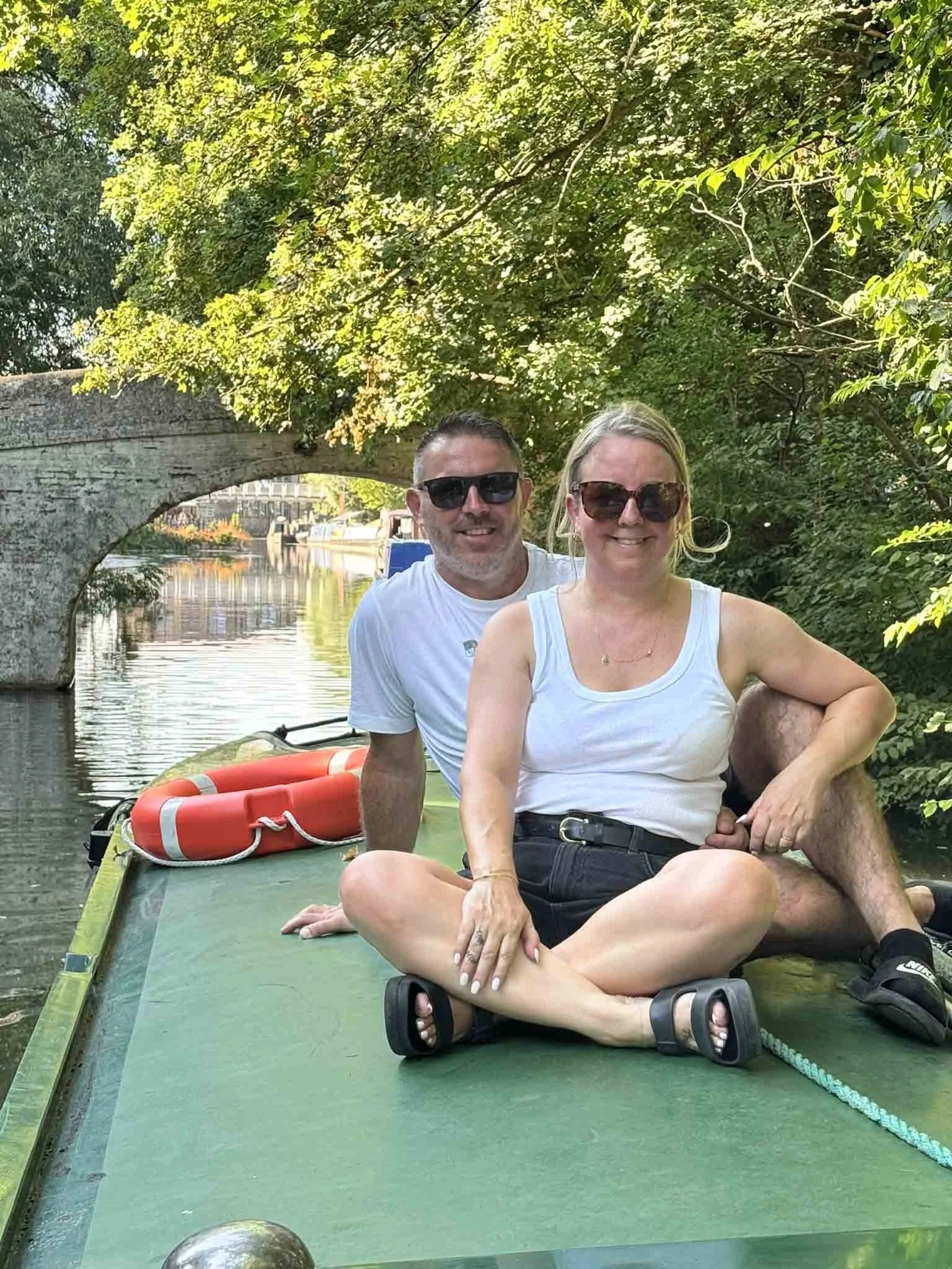 A loving couple enjoying their day out on Tilly the narrowboat in Apsley, Hemel Hempstead