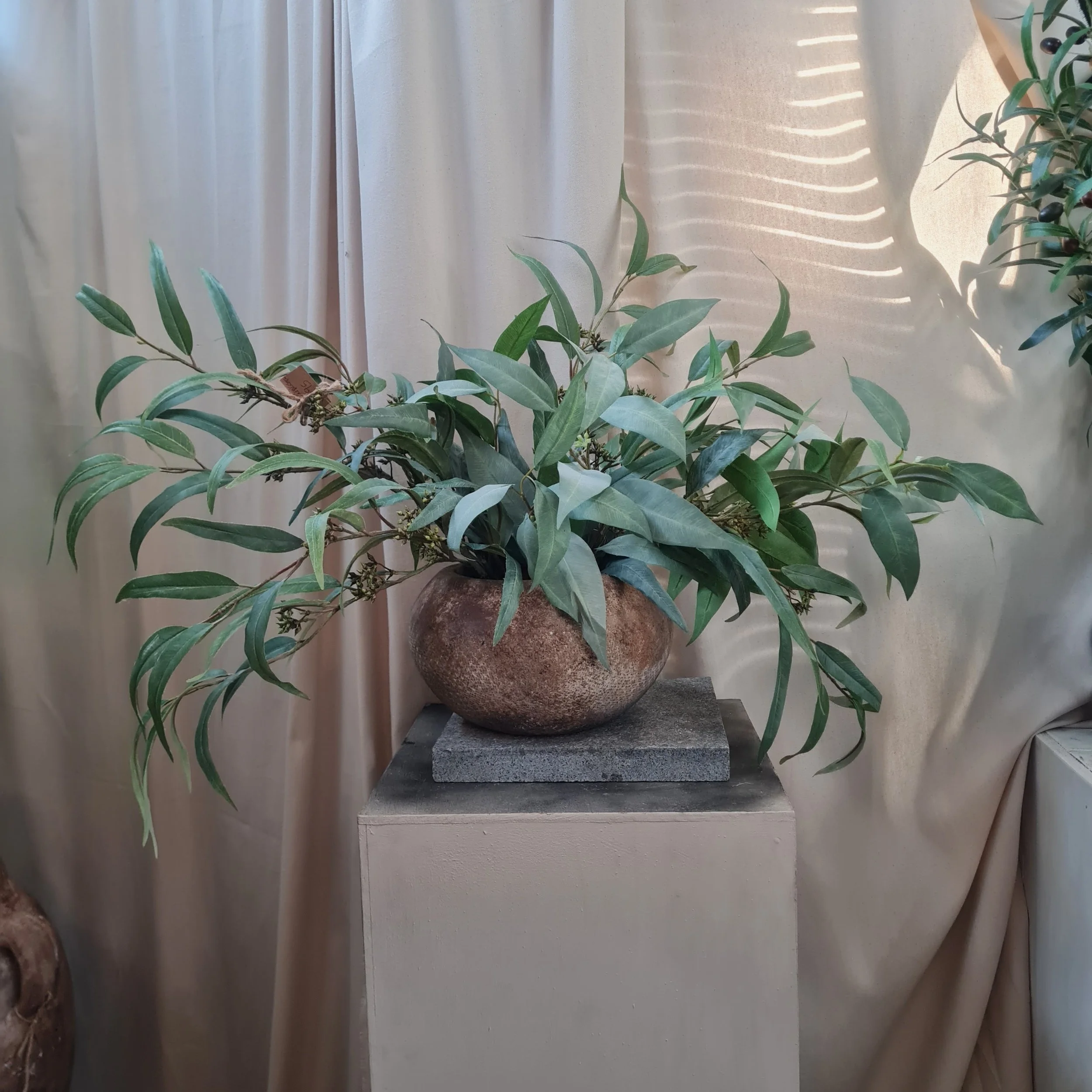 modern rustic pot with artificial eucalyptus leaves arrangementprocessed_20260401_160618.jpg