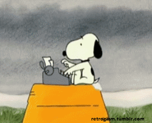 Snoopy, the cartoon dog, sitting at a desk and using a typewriter outdoors against a cloudy sky.