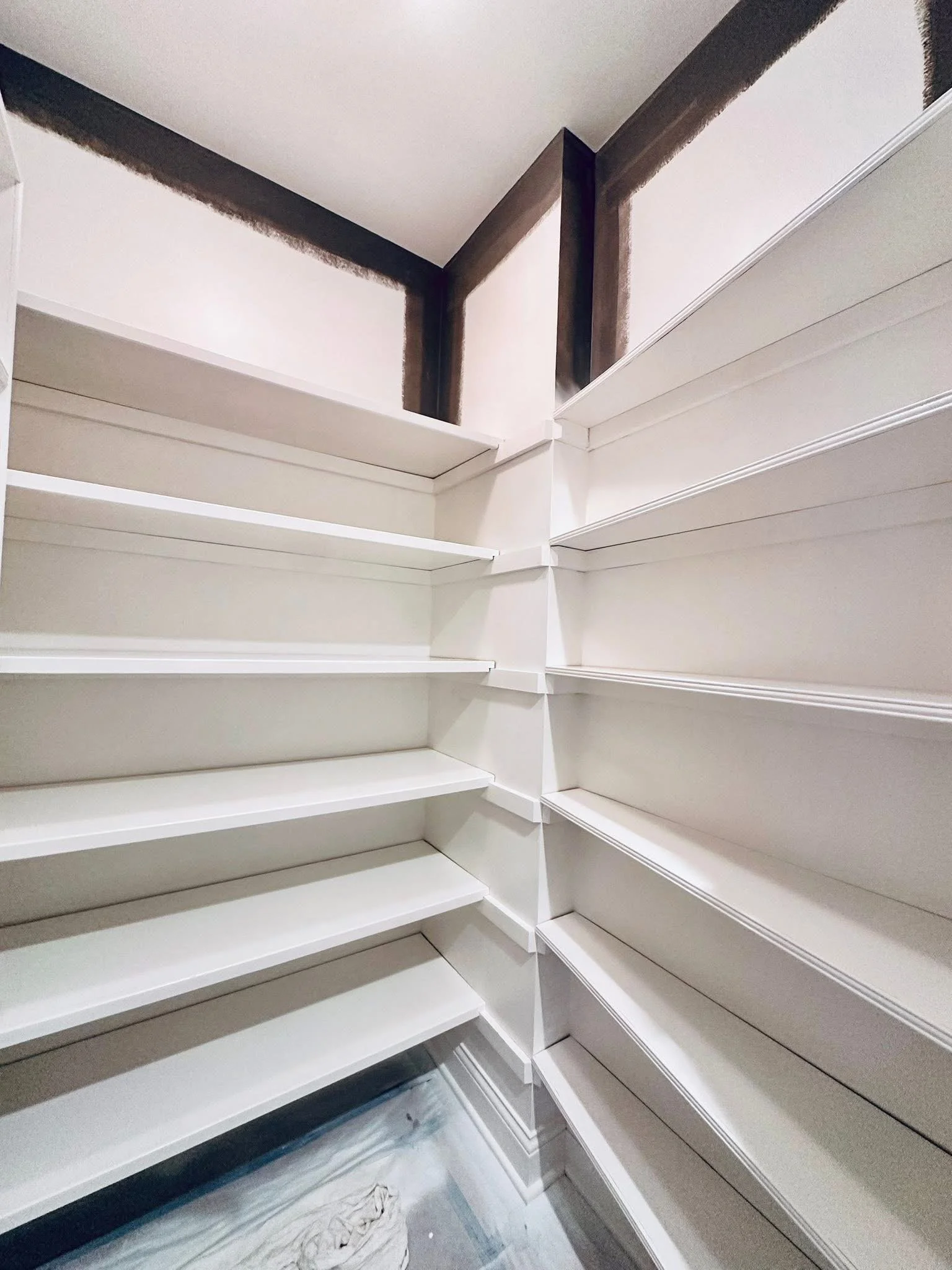 Shelves Painted and waiting for the final coat .JPG