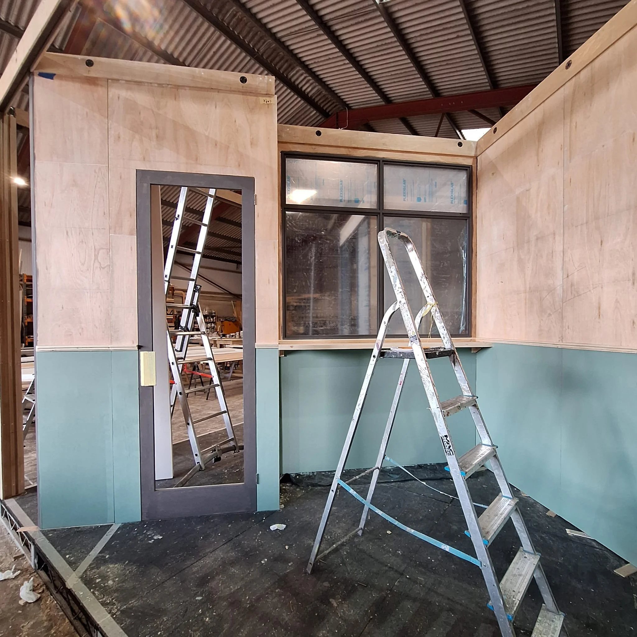 One of four rooms on the revolve for 'The Fifth Step'. I clad the walls with ply before adding the dado rail, shelf table and a secret door.