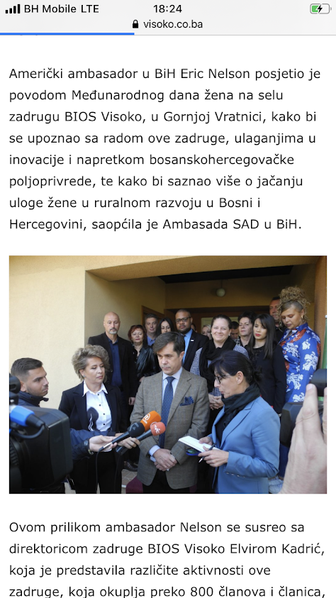 American ambassador in Bosnia and Herzegovina Eric Nelson visiting a women's cooperative in Visoko, Bosnia. Nelson is seen speaking to a group, with journalists and photographers present.