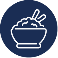 A bowl of rice with chopsticks on top on a dark blue background.