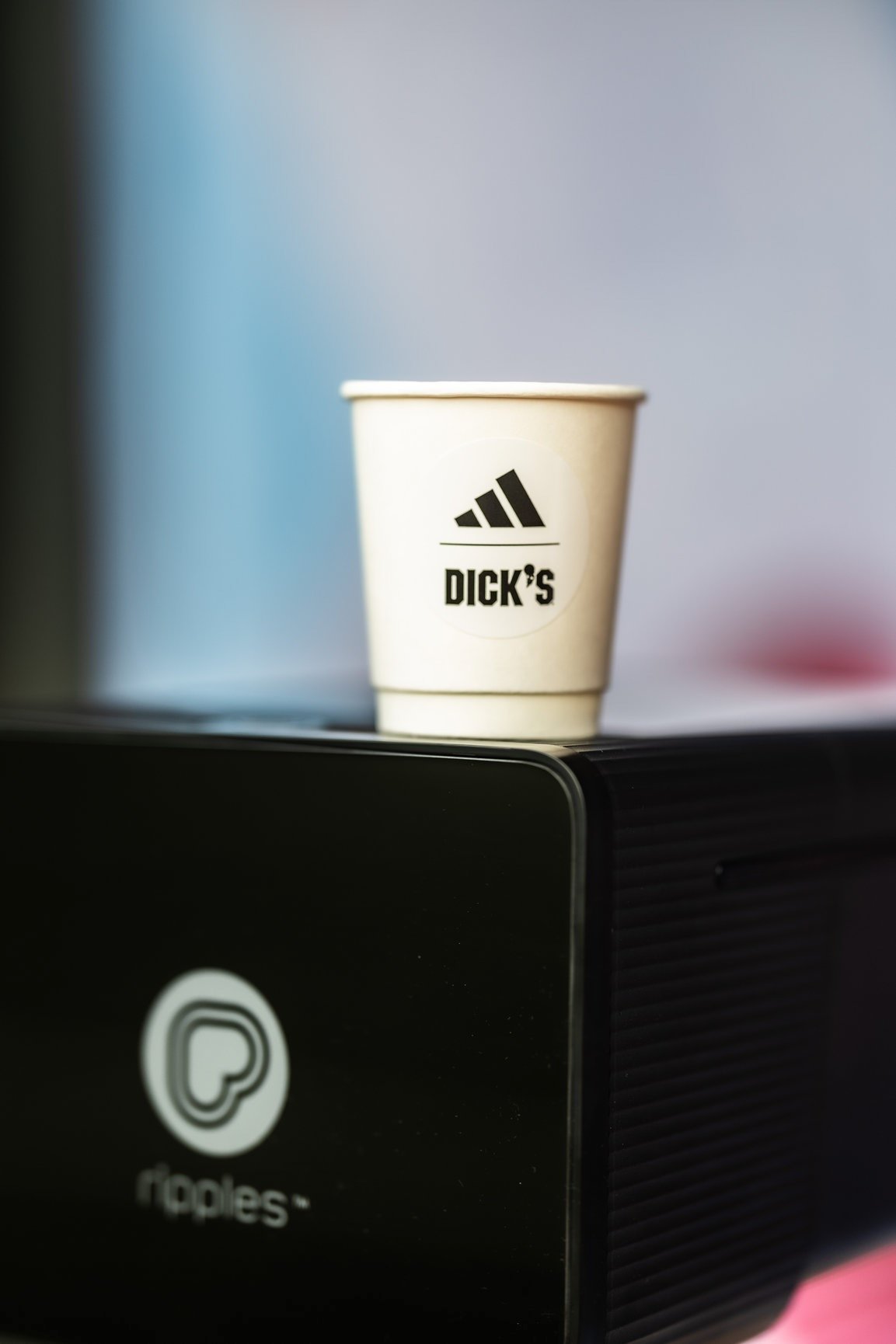 Custom branded coffee cup from The Coffee Cart's Adidas activation at Dick's House of Sport in Knoxville.