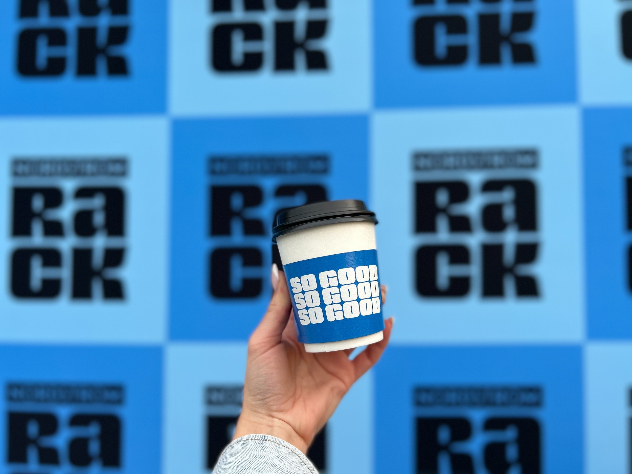 Custom branded 'So Good' coffee cup from The Coffee Cart's Nordstrom Rack grand opening activation in Knoxville.
