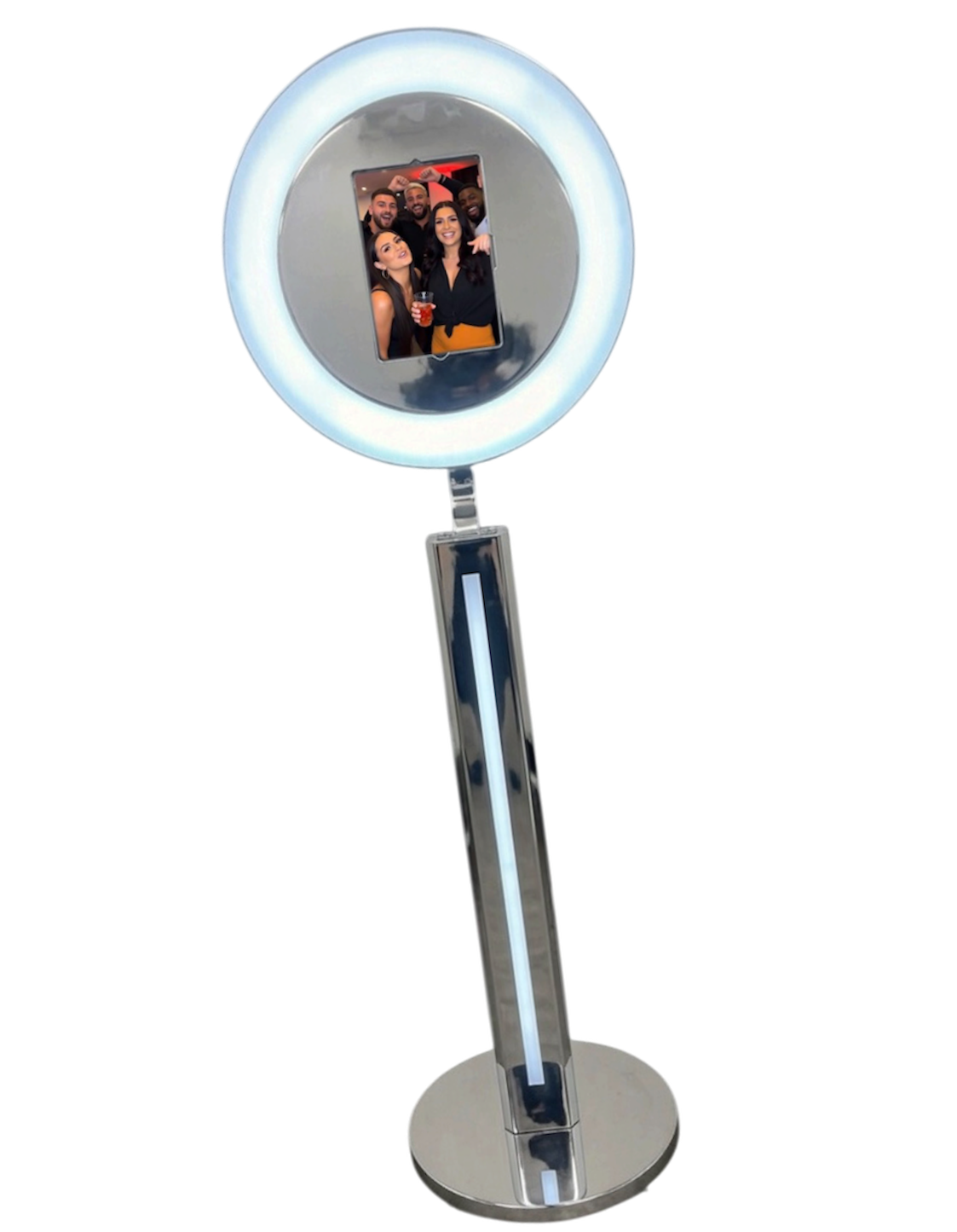A ring light with a smartphone holder showing a group of five friends taking a selfie at a social gathering.
