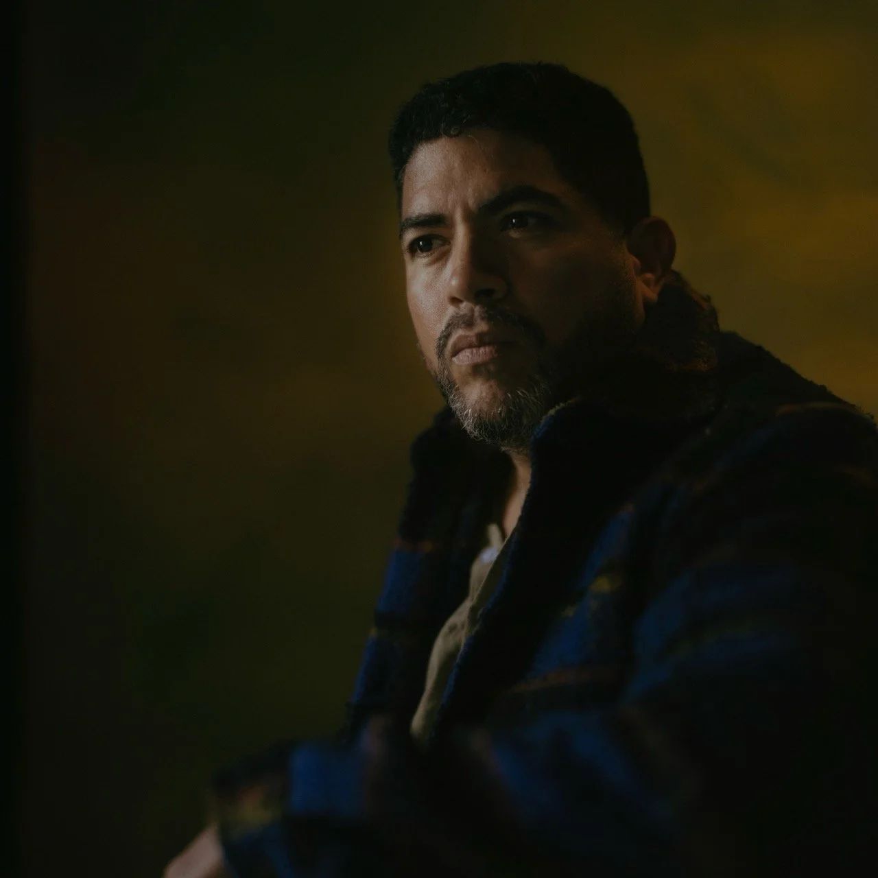 This portrait session with Gabi explores mood and emotion through dim, controlled lighting. Inspired by cinematic visuals, the use of shadow and contrast creates a dramatic and intimate atmosphere.