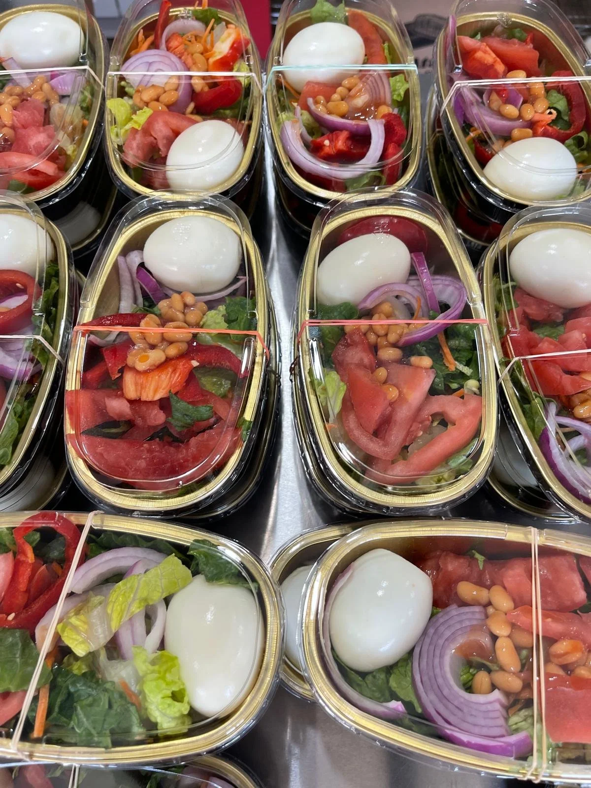 Fresh, flavorful, and perfectly portioned salads made with crisp greens and vibrant vegetables and protein, ideal for any event 