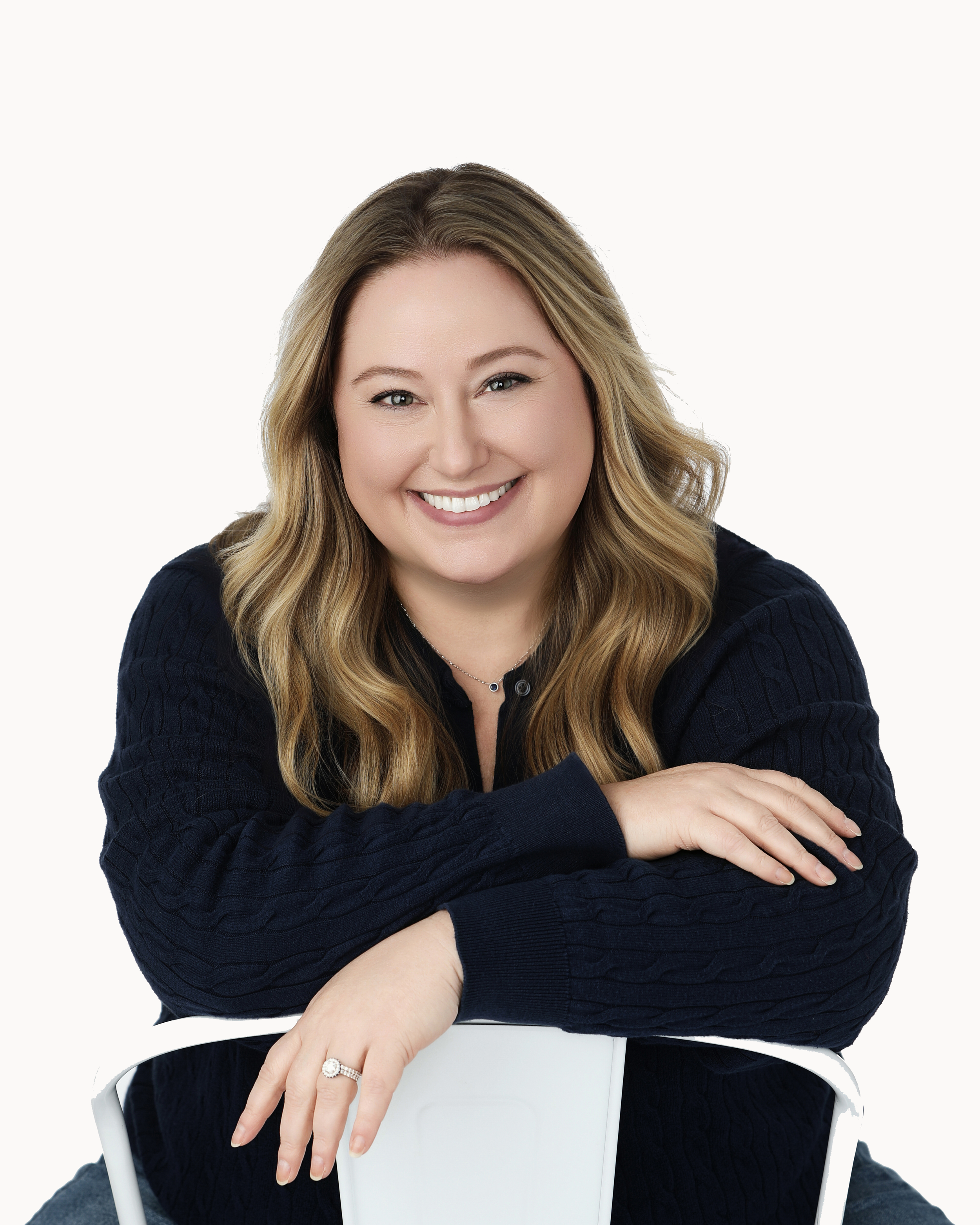 Heather Harris, founder of Midlife But Make It Moisturized and skincare educator specializing in midlife and perimenopause-era skin
