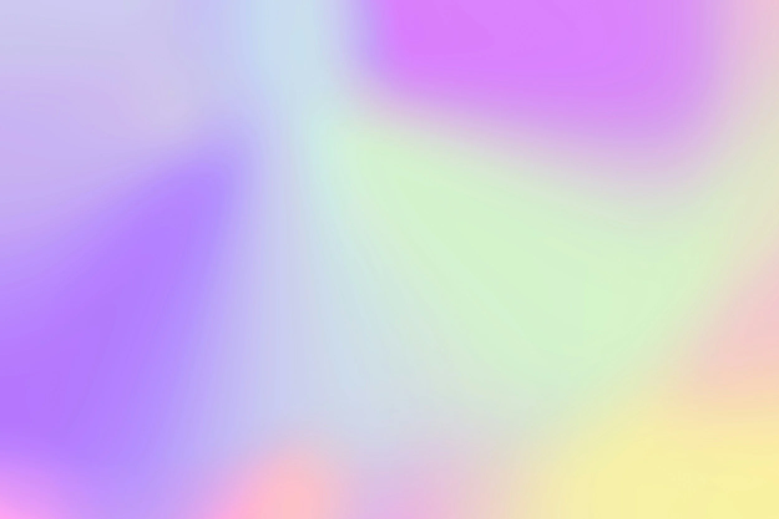 Blurred pastel rainbow colors with no distinct objects.