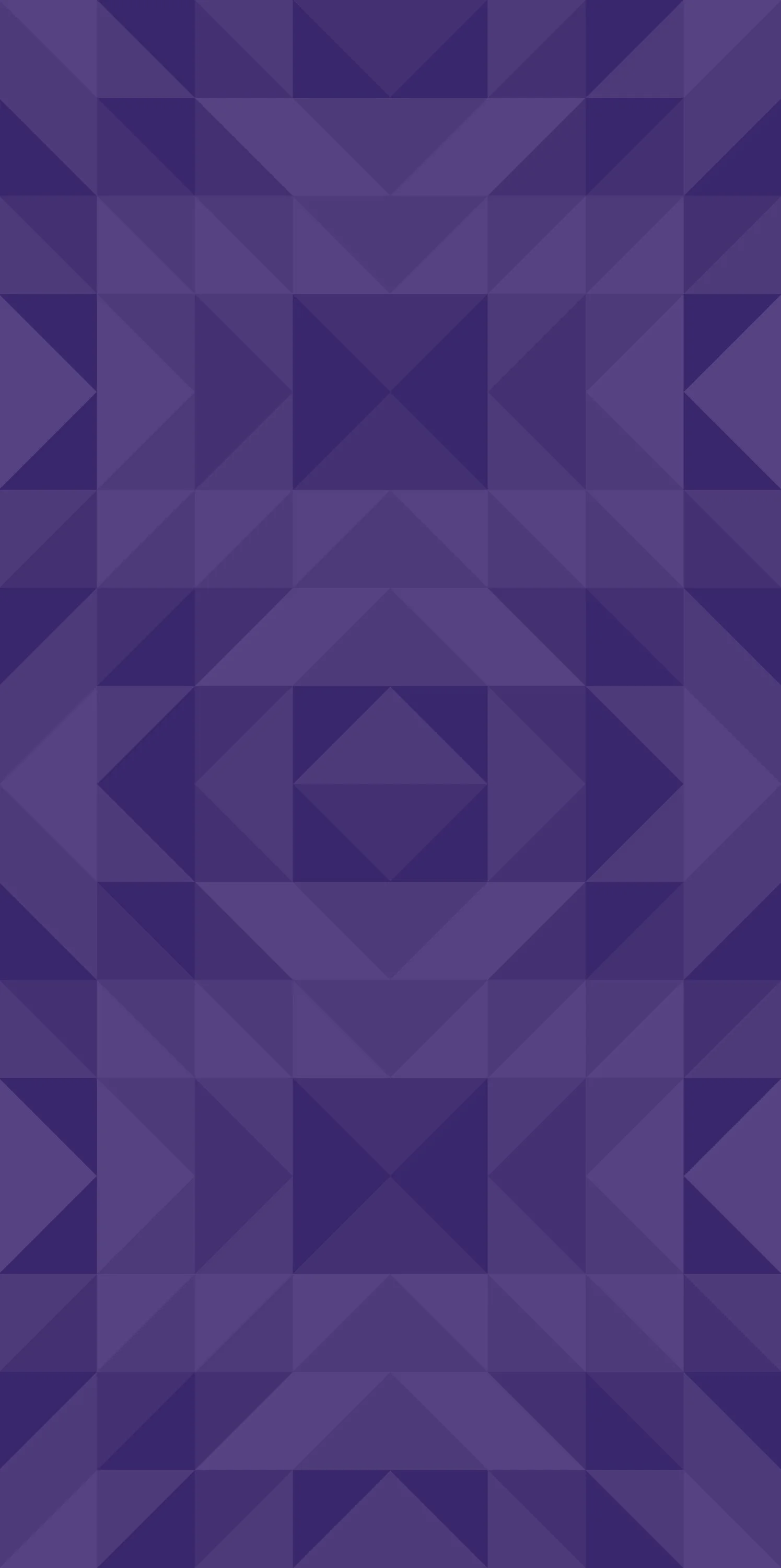 Abstract geometric pattern with various shades of purple in a symmetrical design.