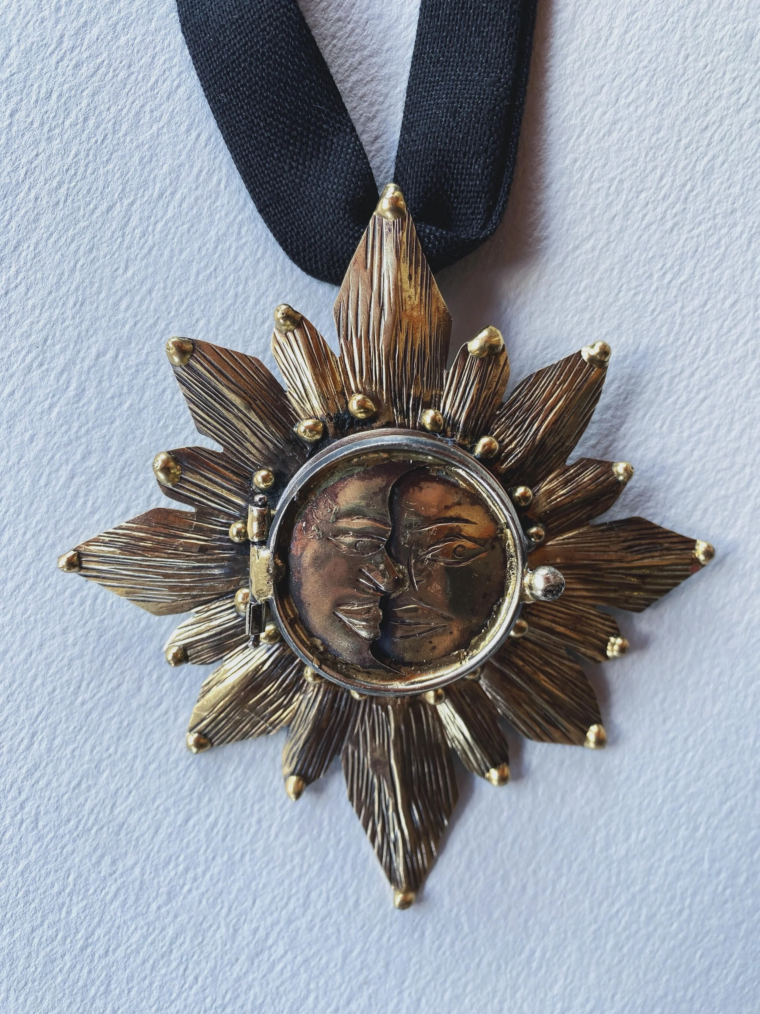 ✨Eclipse✨ new work, my adored moon and sun kiss eclipse reliquary, hidden compartment for your magic, one of a kind in a mix of brass and german silver with antique silver finish to create a vintage used look, now available also on the website. Love 