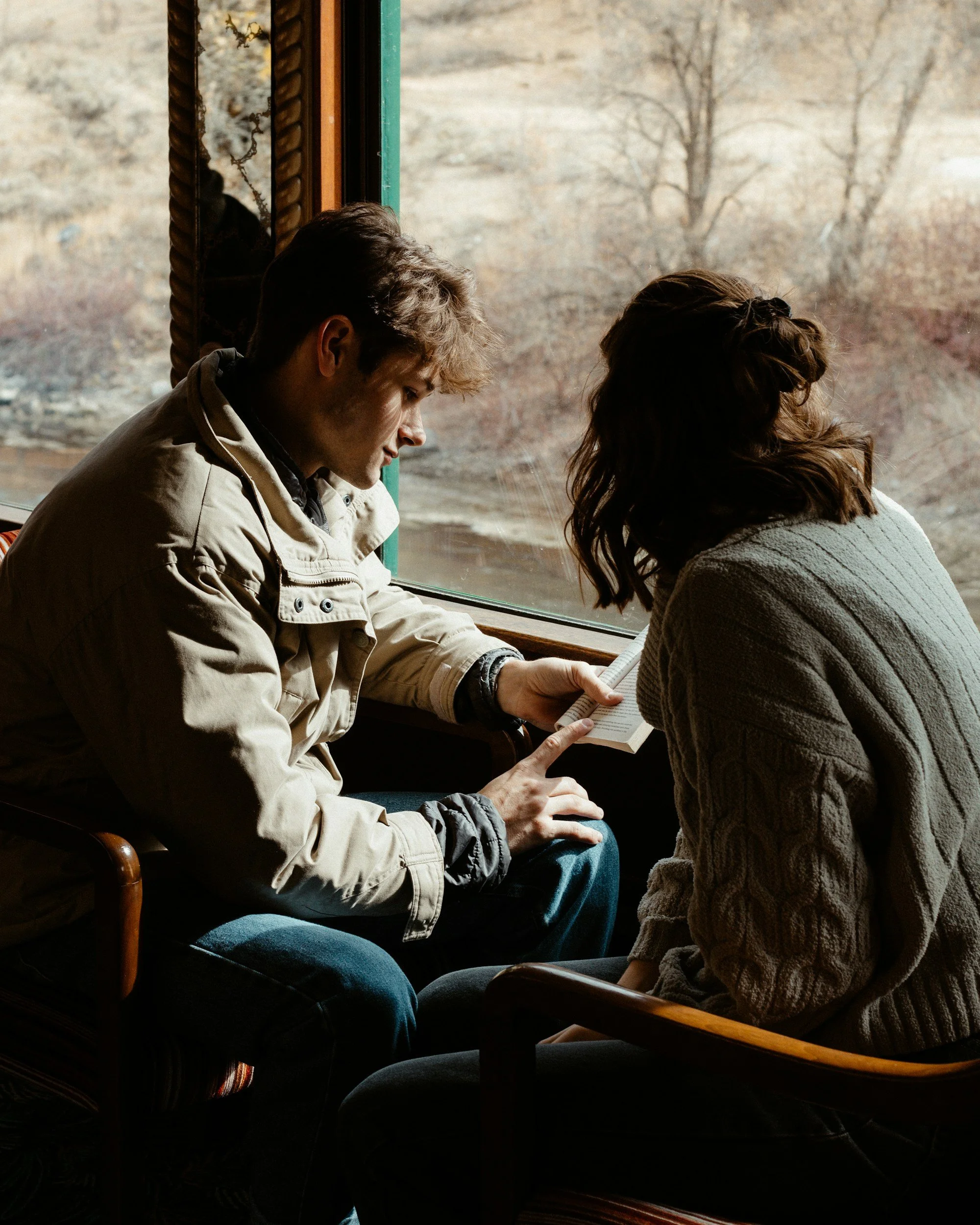 couple looking at journal