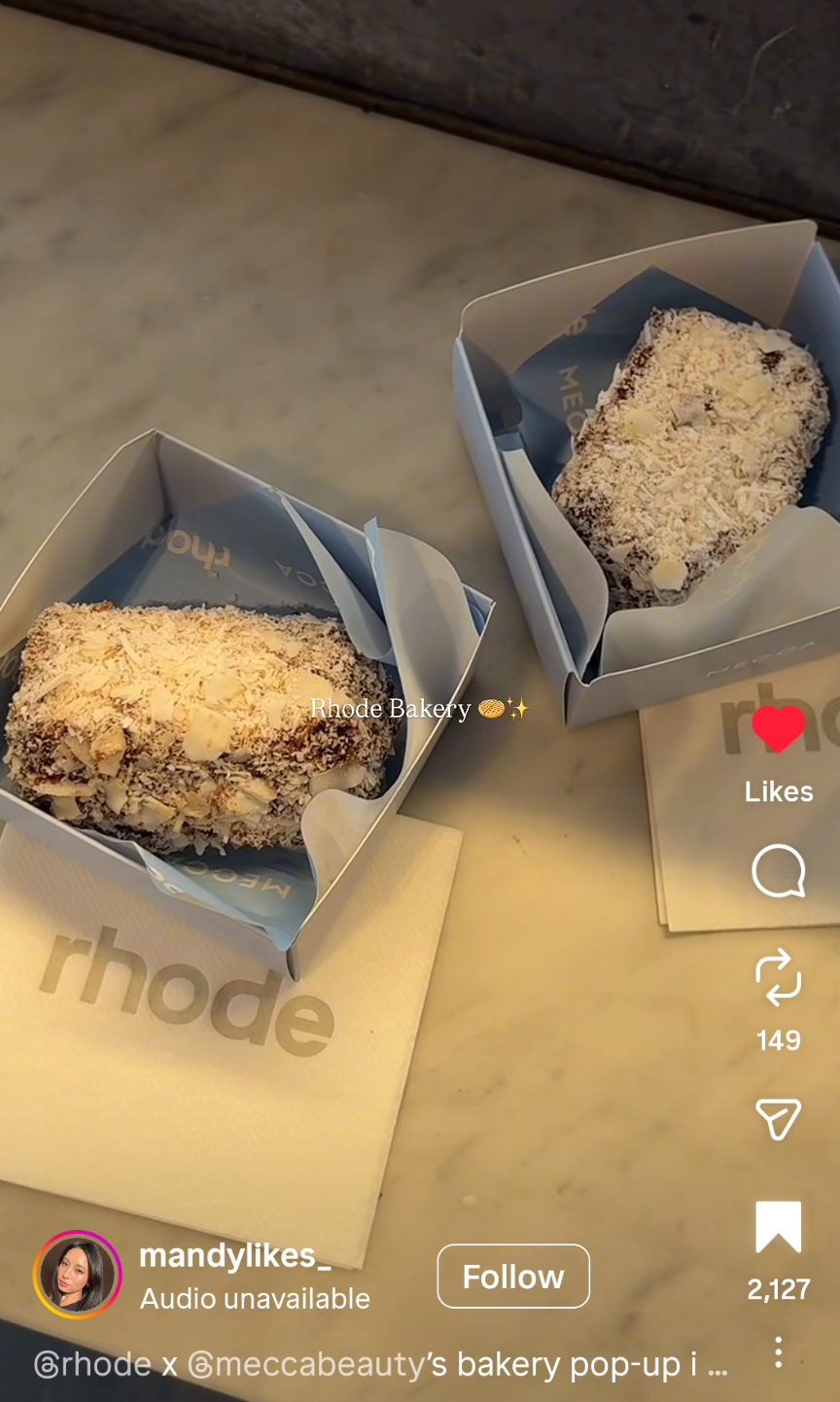 @mandylikes_ on Instagram posting a pastry in branded food packaging for Rhode and Mecca Beauty